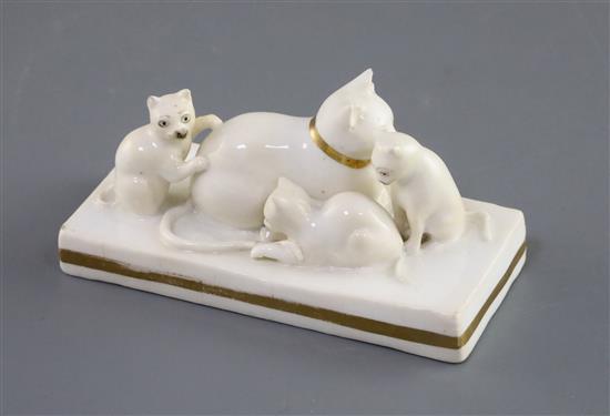 A Rockingham porcelain group of a cat and three kittens, c.1826-30, L. 11cm